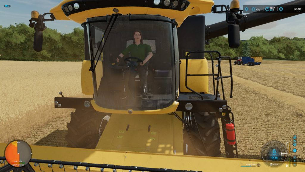 New Holland harvester in field