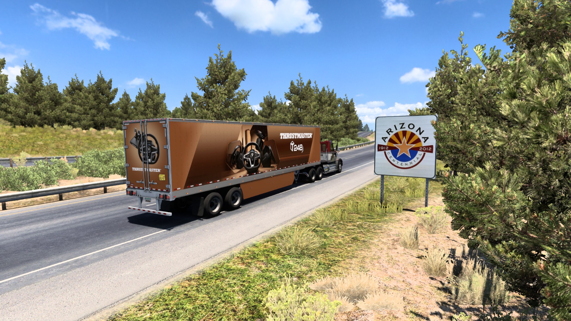 ATS Western Star hauling a Thrustmaster trailer past an Arizona border sign