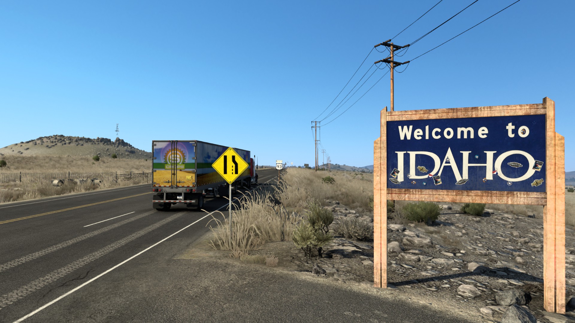 Screenshot of truck passing by a Welcome to Idaho sign
